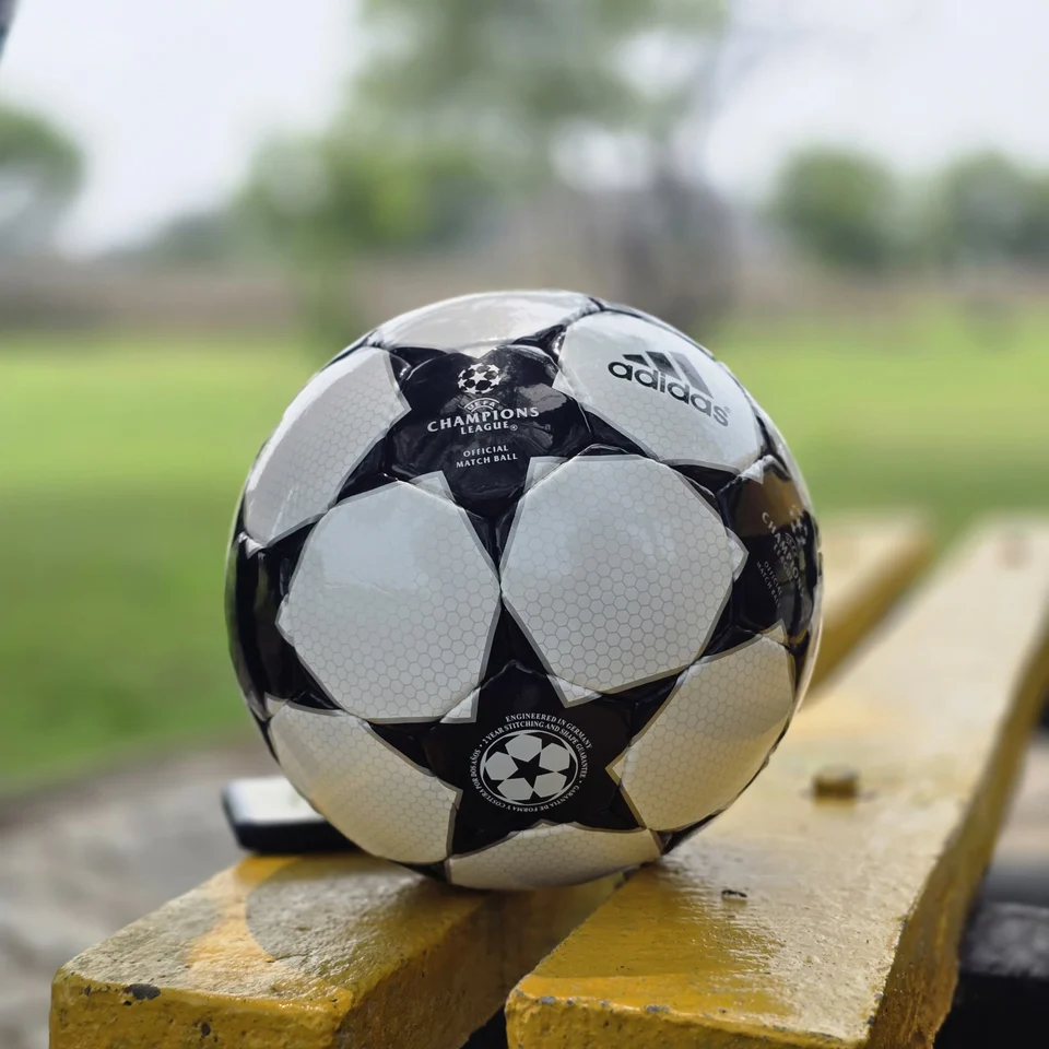Black Finale-Style Star Hand-Stitched Football alternate front angle - black and white handmade football with finale-style star panel graphics