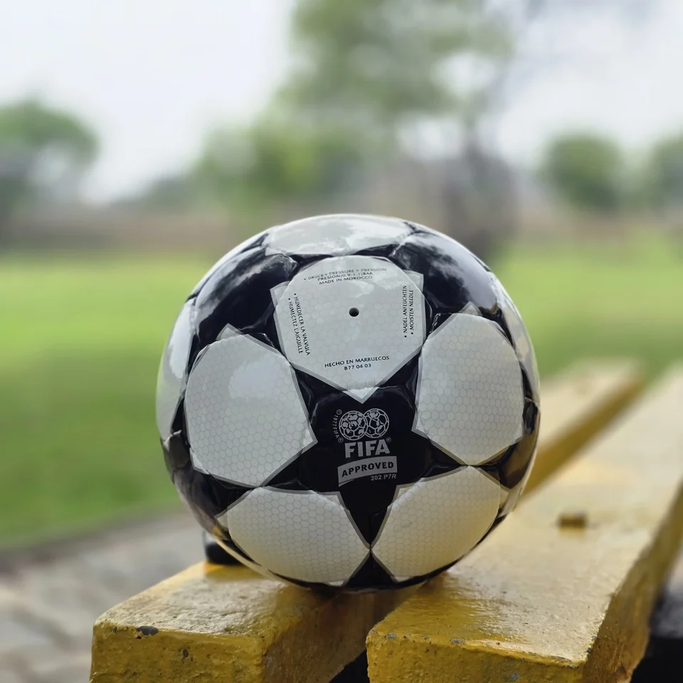 Black Finale-Style Star Hand-Stitched Football side view - black and white handmade football with finale-style star panel graphics