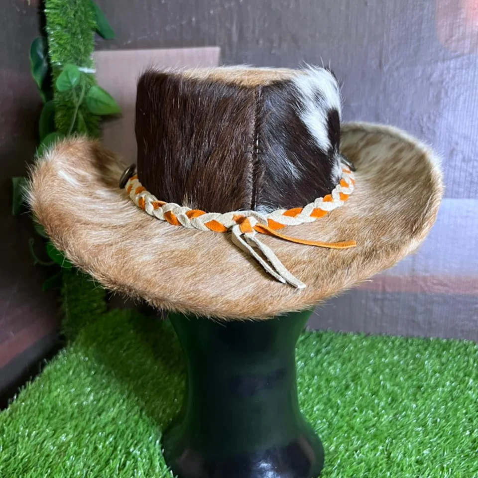 Cowhide Western Hat with Orange Cream Braided Band back view - brown, black, and cream cowhide western hat with orange and cream braided band