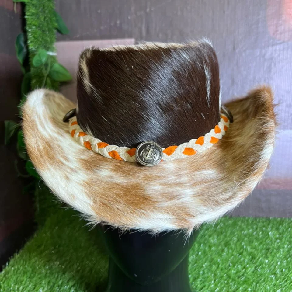 Cowhide Western Hat with Orange Cream Braided Band detail view - brown, black, and cream cowhide western hat with orange and cream braided band