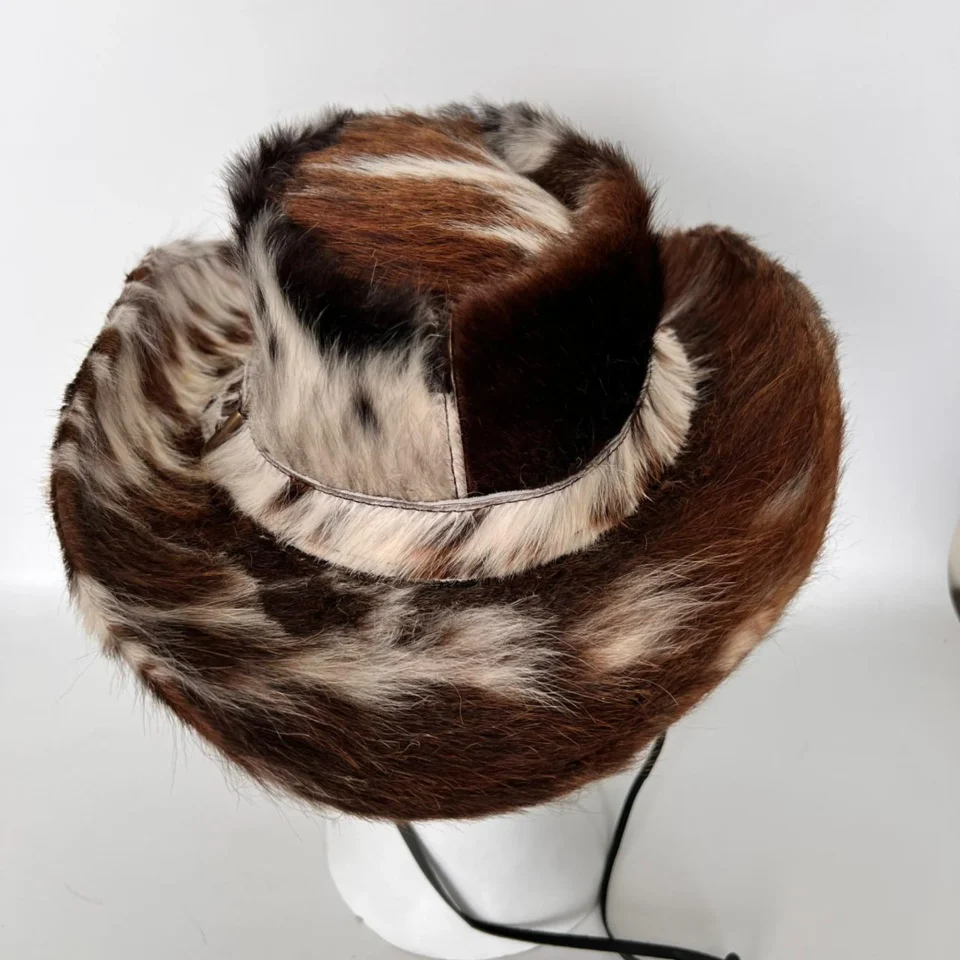 Patchwork Cowhide Western Top Hat back view - brown white and black cowhide pattern western top hat / cowhide hat