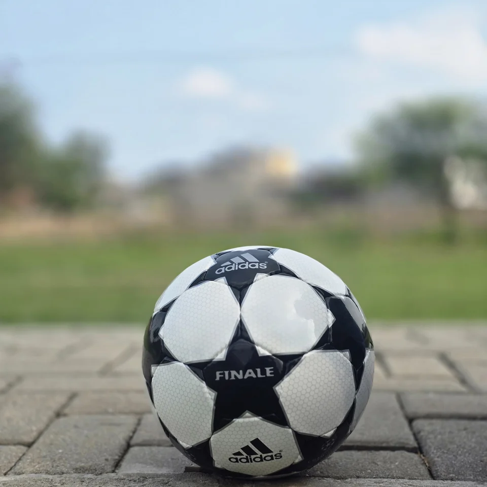 Black White Finale-Style Hand-Stitched Football front view - black and white handmade football with finale-style star graphics