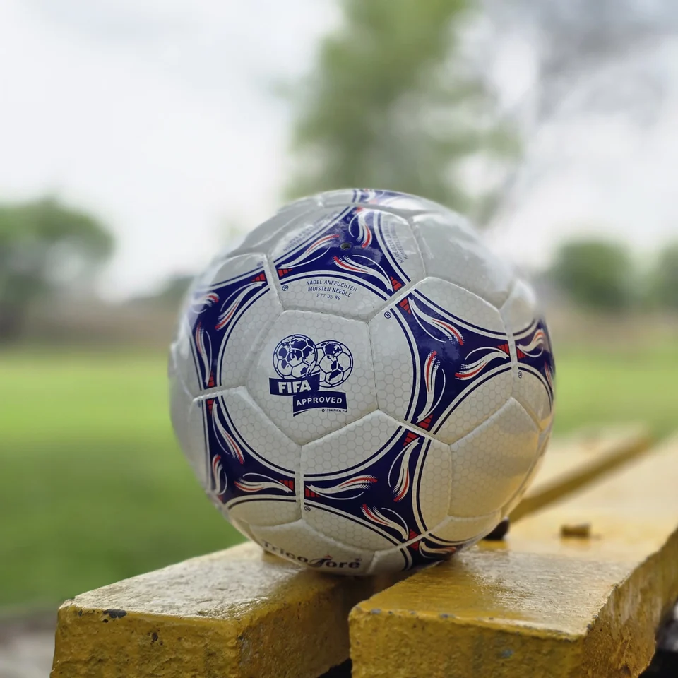Blue Purple Training Hand-Stitched Football alternate front angle - white handmade football with blue and purple stitched graphic panels