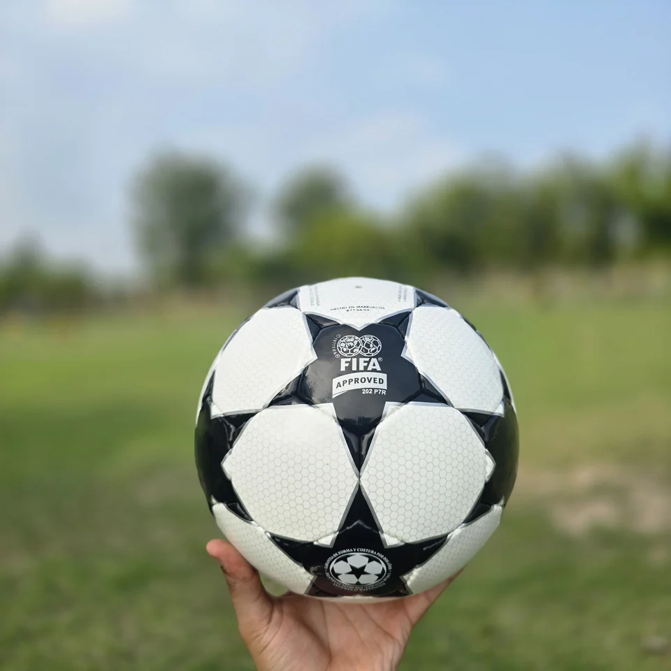 Classic Black Star Hand-Stitched Football front view - black and white handmade football with a classic star-panel match-ball design