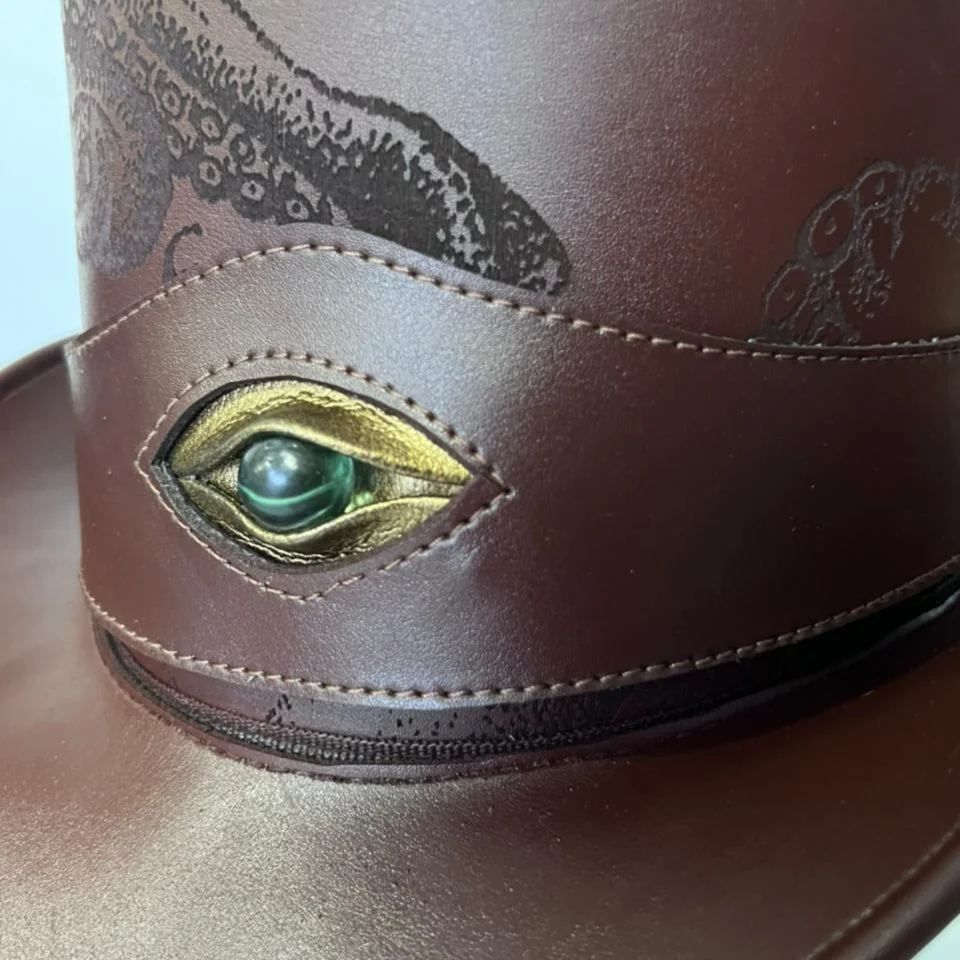 Brown Steampunk Top Hat with Ornate Crown Pattern side view - brown with etched/printed pattern steampunk top hat with ornate crown pattern