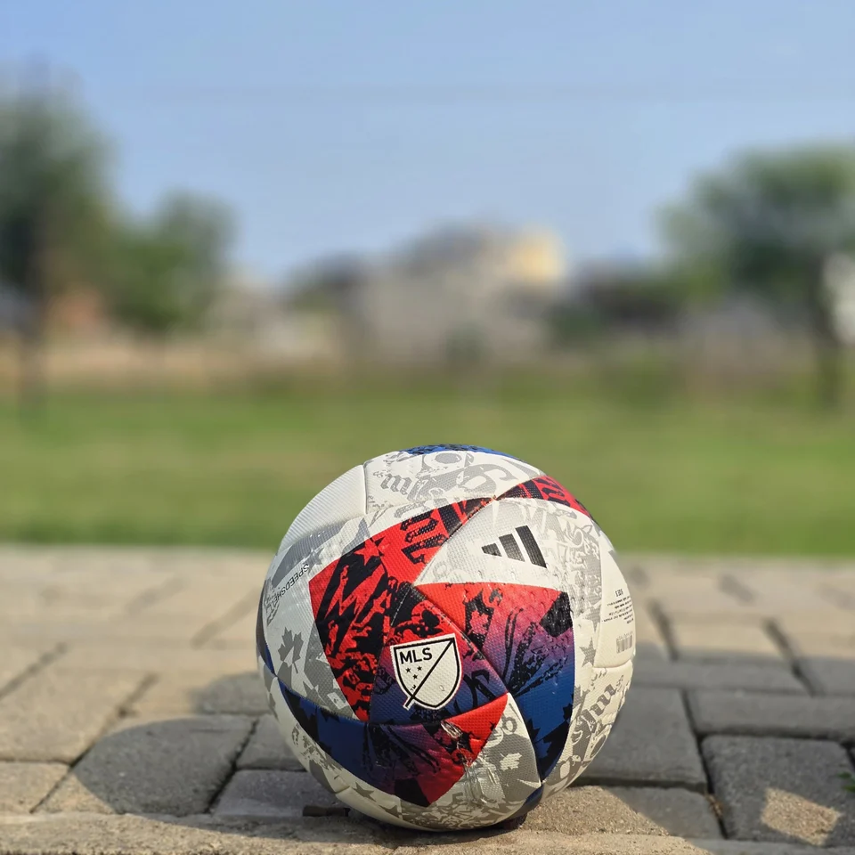 Red Blue & Silver Graphic Hand-Stitched Football alternate front angle - handmade football with red, blue, silver, and white angular graphic panels