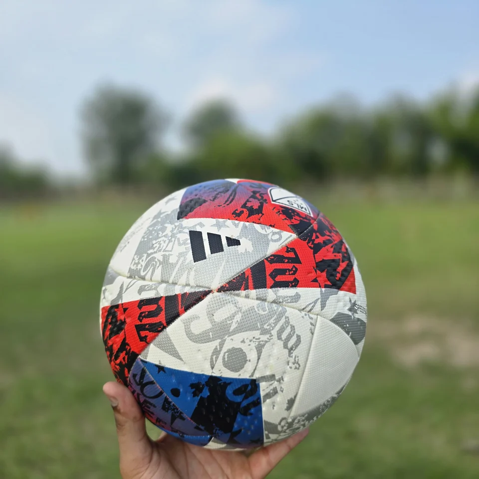 Red Blue Silver M.S Pro Style Thermal Bonded Football alternate front angle - thermal bonded football with red, blue, silver, and white angular graphics and visible M