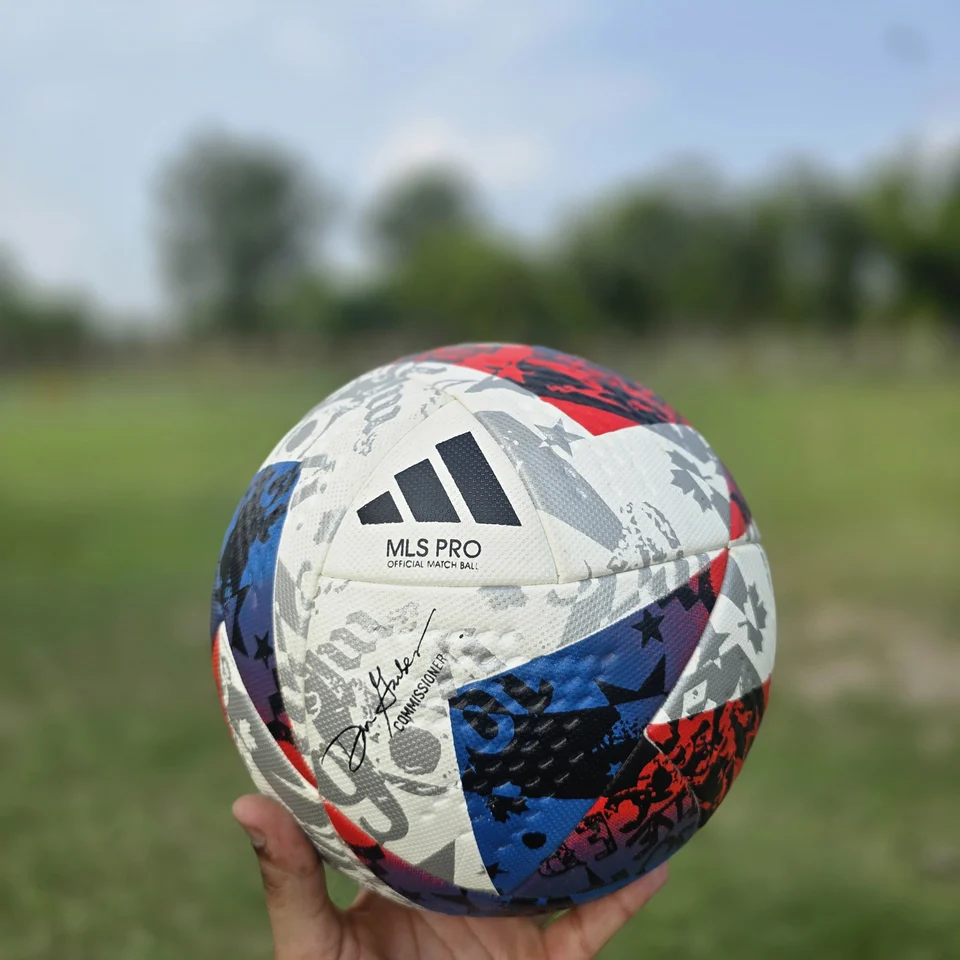 Red Blue Silver M.S Pro Style Thermal Bonded Football front view - thermal bonded football with red, blue, silver, and white angular graphics and visible M