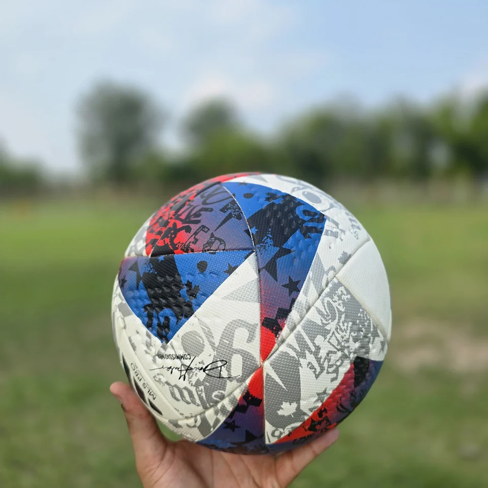 Red Blue Silver M.S Pro Style Thermal Bonded Football side view - thermal bonded football with red, blue, silver, and white angular graphics and visible M