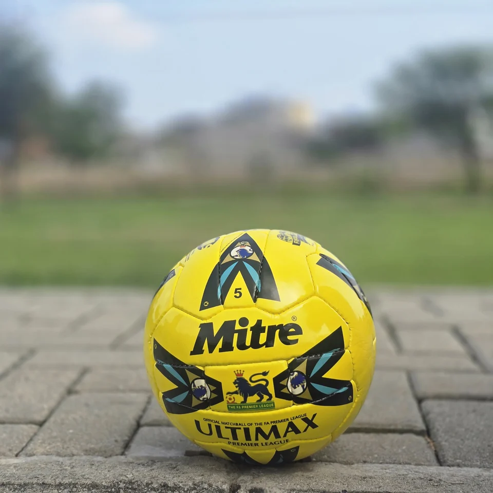 Yellow Black Graphic Hand-Stitched Football back view - bright yellow handmade football with black angular graphic panels