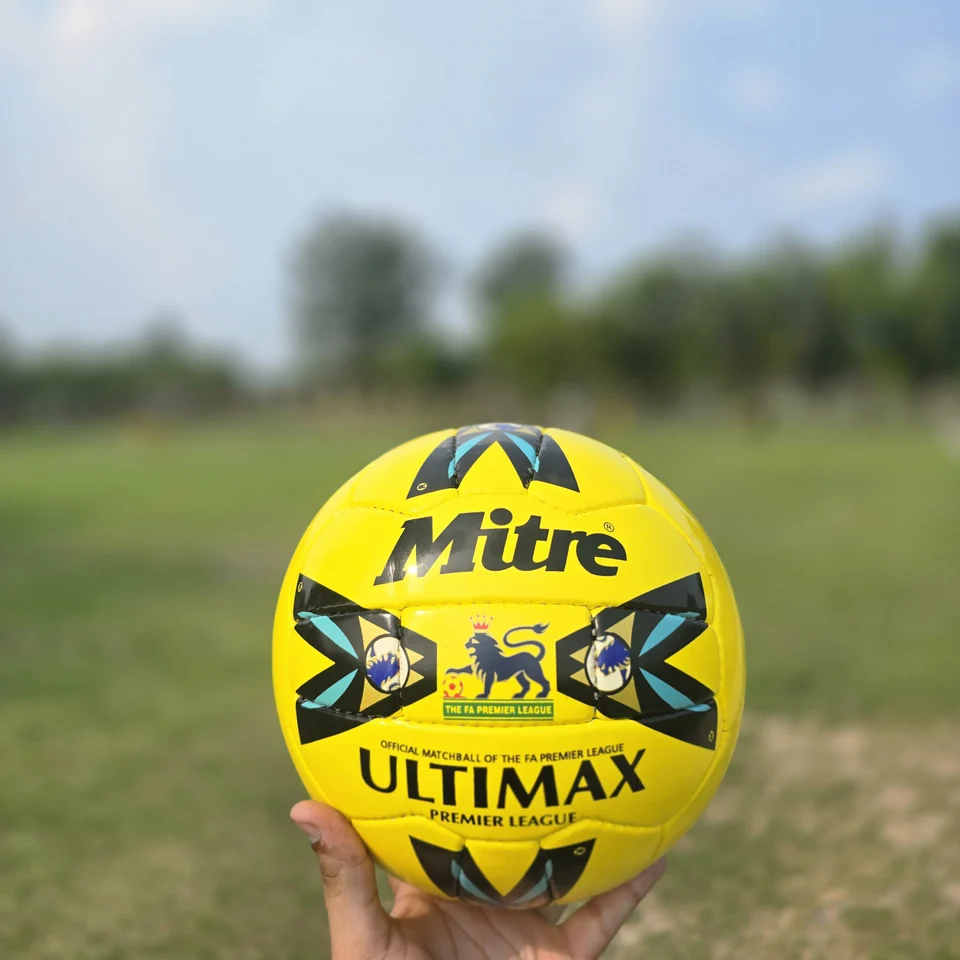Yellow Premier-Style Printed Hand-Stitched Football back view - yellow handmade football with black graphic panels and visible printed match-ball style text